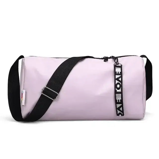 Women's gym fitness training bag in light purple with adjustable strap, ideal for organizing workout gear.