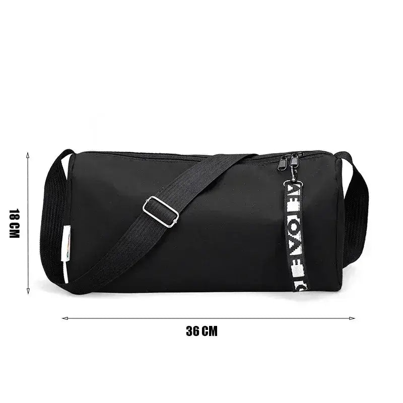 Black women's gym fitness training bag with adjustable strap, measuring 36 cm x 18 cm, for organized workout gear.